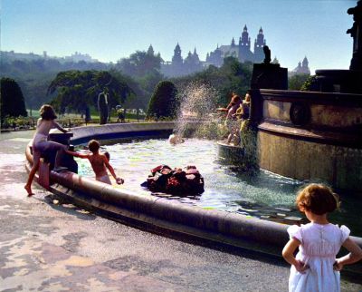 A Little Girl watches Children playing in the Stewart Memorial Fountain in Kelvingrove Park on a hot Summer Day, 1955

