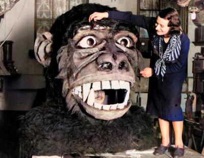 A Man inside the Mouth of a 4 feet 6 inches tall Monkey Head which was made from Cardboard and Paper by a Stage Props Company for a Glasgow Pantomime, 11th December 1933
