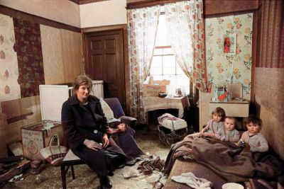 A Mother and Three Little Children inside their Flat in the Gorbals Glasgow, 1969
