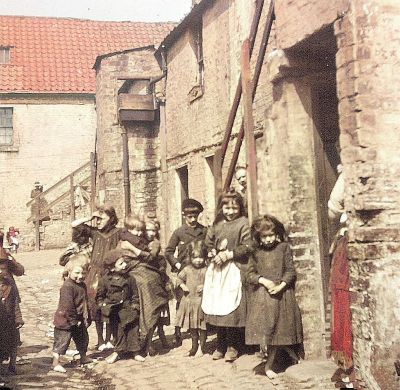 Children outside a Calton tenement  Glasgow 1916
