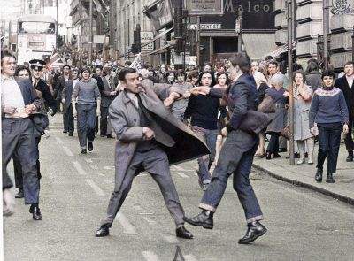Colourised Photo Of Special Branch Detective Inspector George Johnstone with fag in mouth, being attacked by a youth with an open razor in Renfield Street, Glasgow
