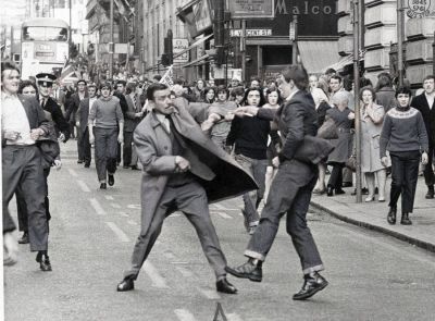 Detective Inspector George Johnstone being attacked by a youth with an open razor in Renfield Street, Glasgow 1971
