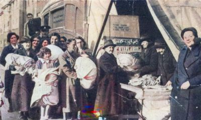 People selling their old clothes etc to the Ragman
