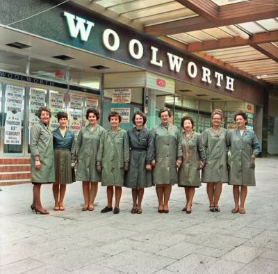 Shop assistants pose outside the New Woolworth store (possibly East Kilbride) Circa 30th January 1970
