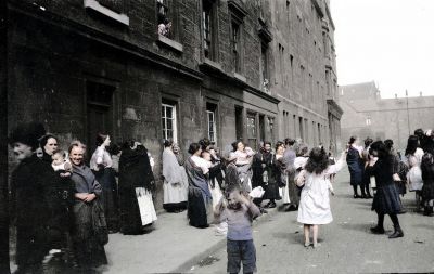 Street scene, women and children, Glasgow, Scotland, early 1900s
