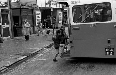 Two Young Boys Boarding A Bus Outside Of The Grosvener Cinema On Byres Road Glasgow West End 1969
