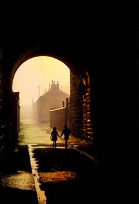 Two children walking under an Archway in the Gorbals area of Glasgow 31st January 1948
