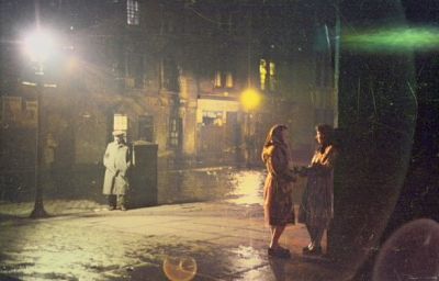 Two women chat on a street corner in the Gorbals area of Glasgow 31st January 1948
