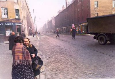 Two women chatting on a street corner in Glasgow, April 1939
