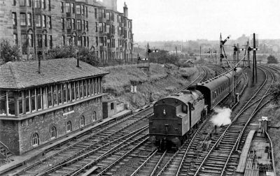 View of a departing train on the rails of Maryhill Central Station Taken from Garrioch Road Bridge Glasgow 1963
View of a departing train on the rails of Maryhill Central Station Taken from Garrioch Road Bridge Glasgow 1963
Mots-clés: View of a departing train on the rails of Maryhill Central Station Taken from Garrioch Road Bridge Glasgow 1963