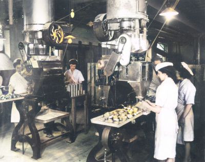 Workers packing Rations at the SCWS, Shieldhall, Glasgow Circa 1942.
