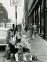 Flower_seller_Bessie_Swan__Sauchiehall_st_Glasgow_1956.jpg